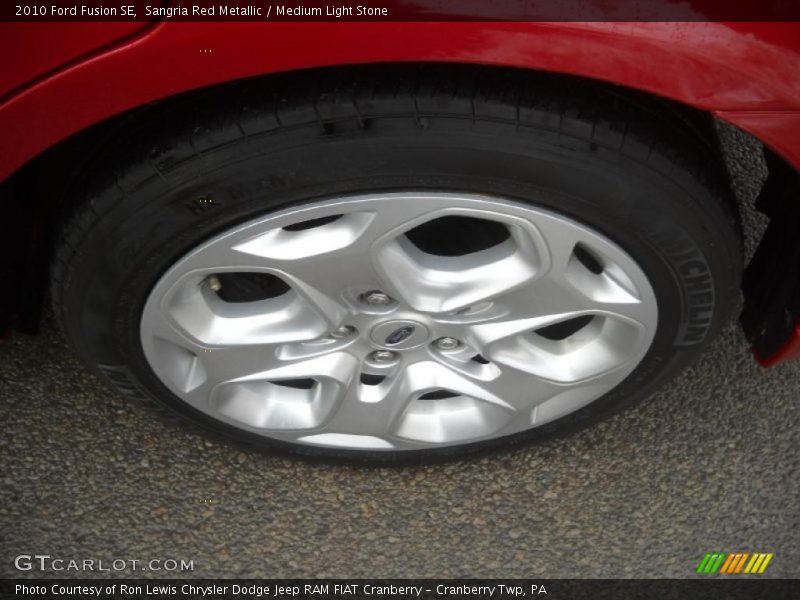 Sangria Red Metallic / Medium Light Stone 2010 Ford Fusion SE