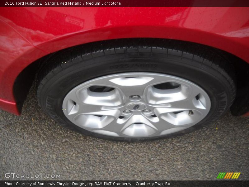 Sangria Red Metallic / Medium Light Stone 2010 Ford Fusion SE