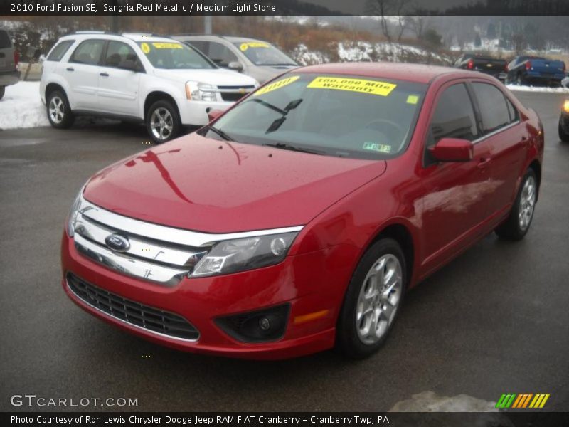 Sangria Red Metallic / Medium Light Stone 2010 Ford Fusion SE
