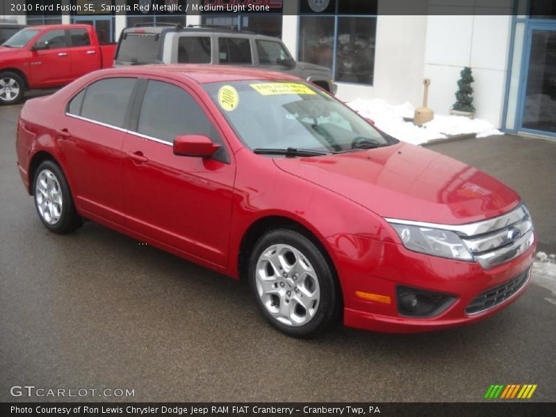 Sangria Red Metallic / Medium Light Stone 2010 Ford Fusion SE