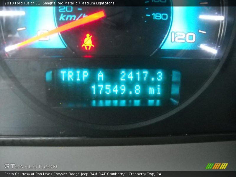 Sangria Red Metallic / Medium Light Stone 2010 Ford Fusion SE