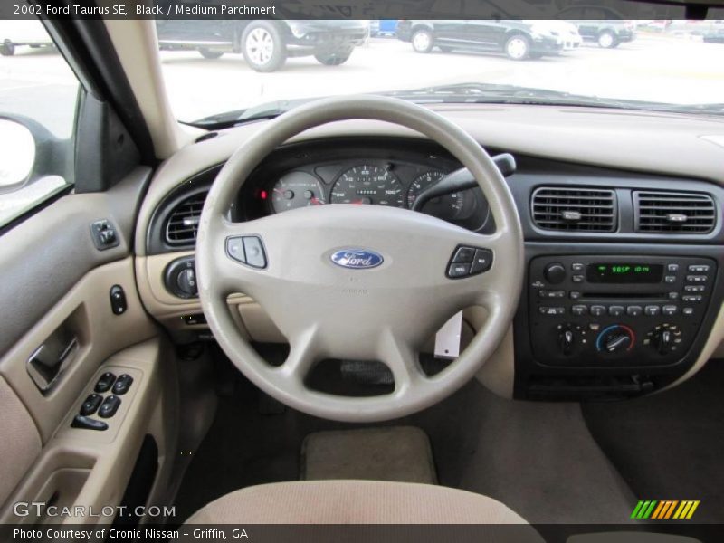 Black / Medium Parchment 2002 Ford Taurus SE