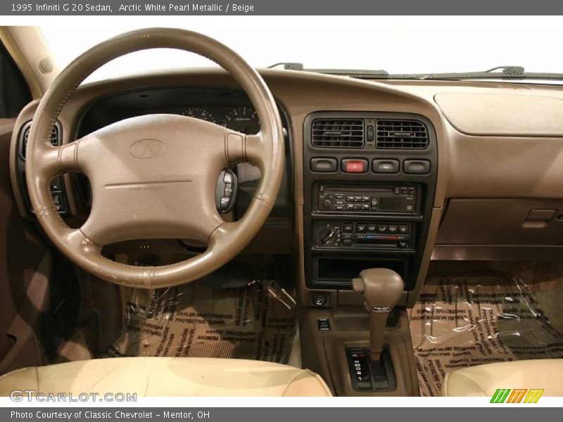 Arctic White Pearl Metallic / Beige 1995 Infiniti G 20 Sedan