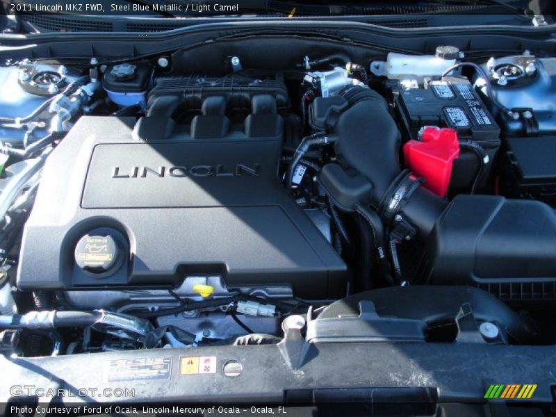 Steel Blue Metallic / Light Camel 2011 Lincoln MKZ FWD