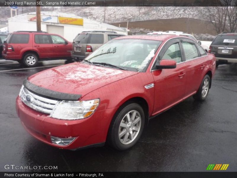 Sangria Red Metallic / Camel 2009 Ford Taurus SEL