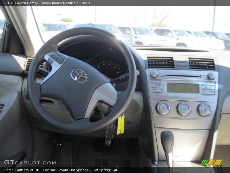 Sandy Beach Metallic / Bisque 2010 Toyota Camry
