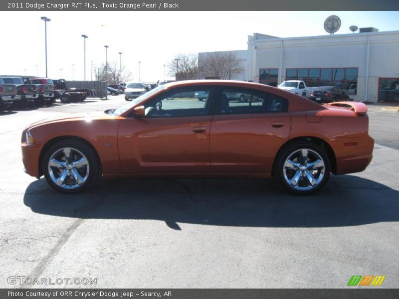 Toxic Orange Pearl / Black 2011 Dodge Charger R/T Plus