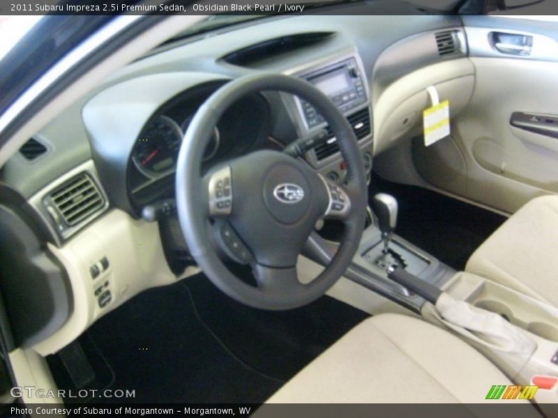 Obsidian Black Pearl / Ivory 2011 Subaru Impreza 2.5i Premium Sedan