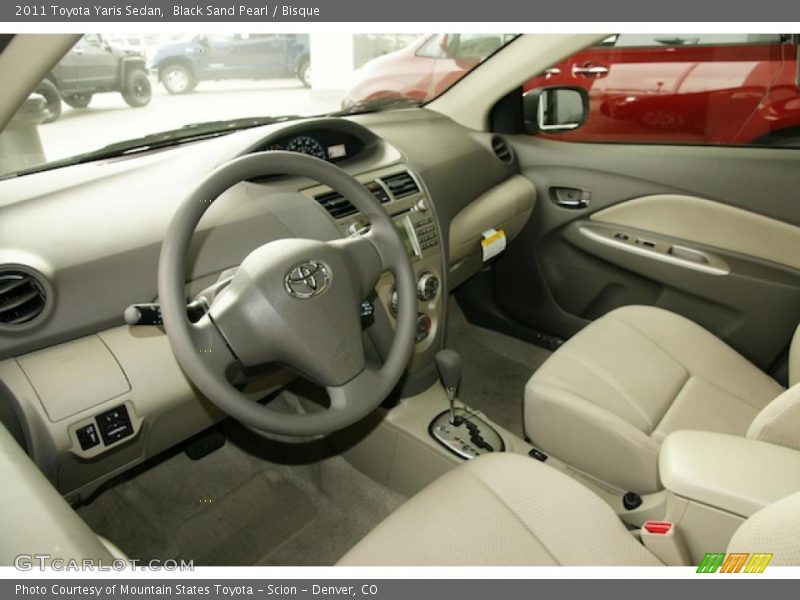 Black Sand Pearl / Bisque 2011 Toyota Yaris Sedan