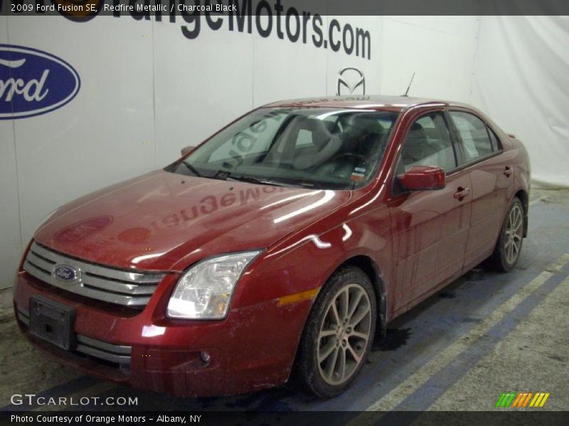 Redfire Metallic / Charcoal Black 2009 Ford Fusion SE