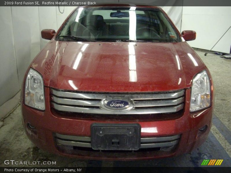 Redfire Metallic / Charcoal Black 2009 Ford Fusion SE