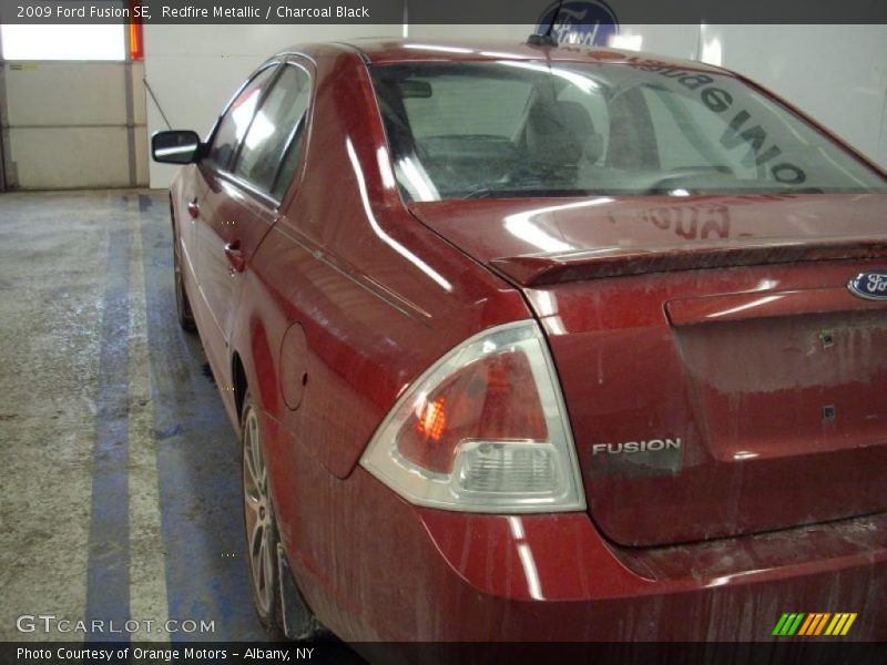 Redfire Metallic / Charcoal Black 2009 Ford Fusion SE