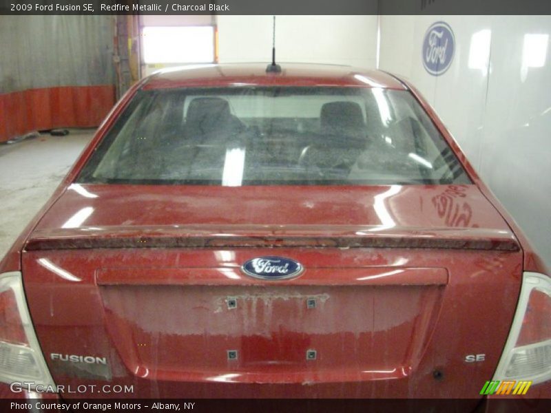 Redfire Metallic / Charcoal Black 2009 Ford Fusion SE