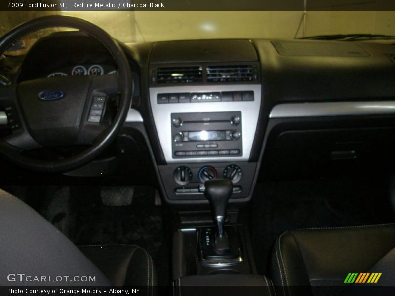 Redfire Metallic / Charcoal Black 2009 Ford Fusion SE