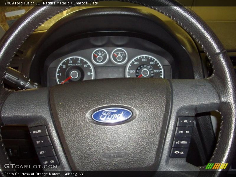 Redfire Metallic / Charcoal Black 2009 Ford Fusion SE