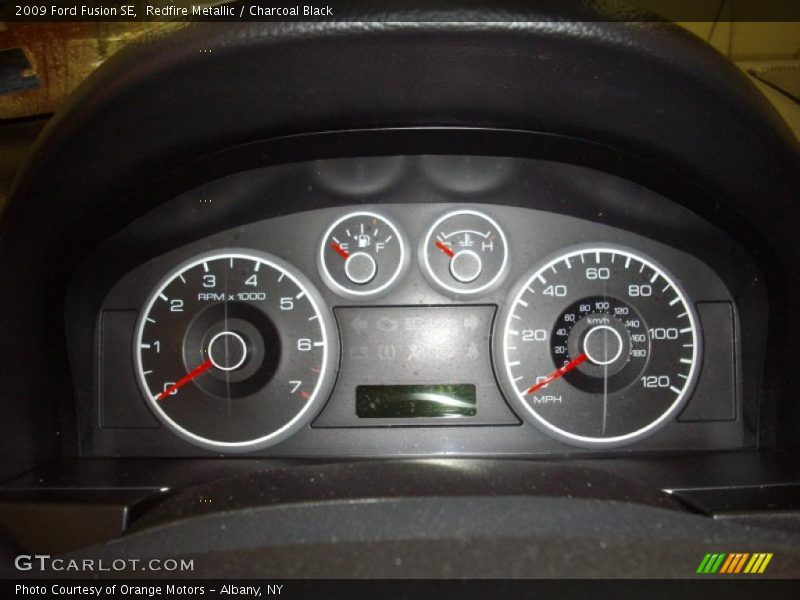 Redfire Metallic / Charcoal Black 2009 Ford Fusion SE