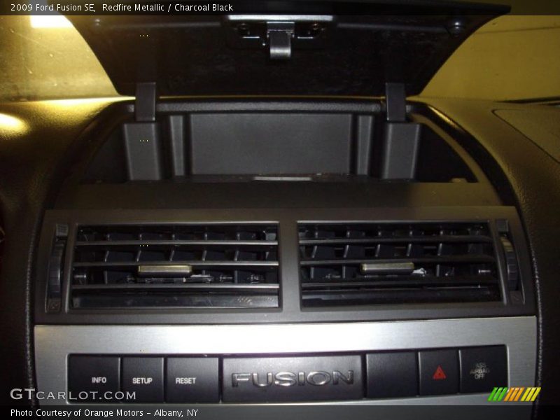 Redfire Metallic / Charcoal Black 2009 Ford Fusion SE