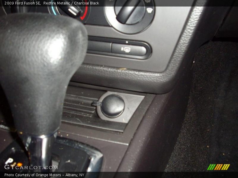 Redfire Metallic / Charcoal Black 2009 Ford Fusion SE