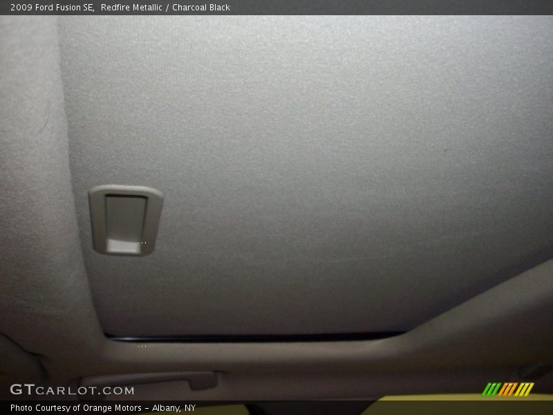 Redfire Metallic / Charcoal Black 2009 Ford Fusion SE