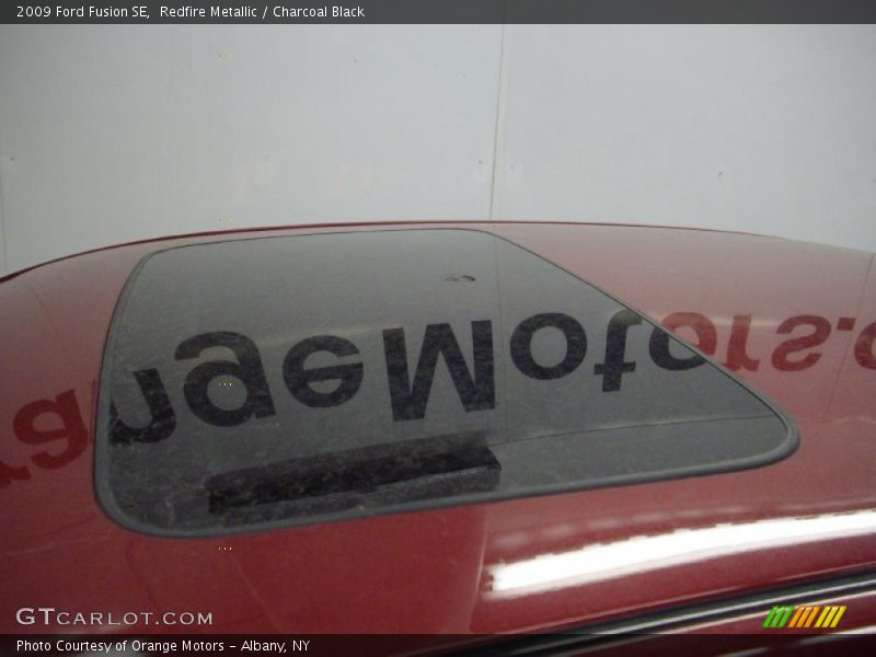 Redfire Metallic / Charcoal Black 2009 Ford Fusion SE