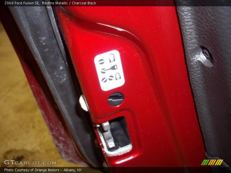 Redfire Metallic / Charcoal Black 2009 Ford Fusion SE