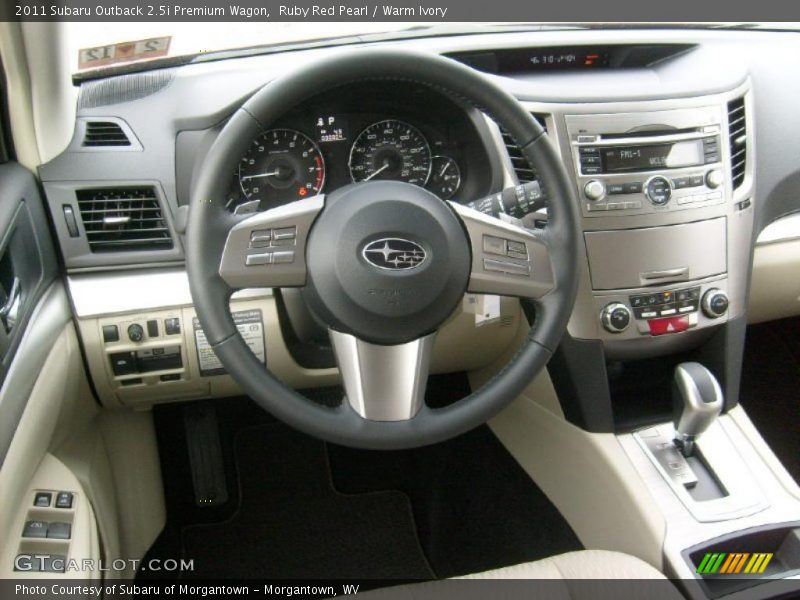 Ruby Red Pearl / Warm Ivory 2011 Subaru Outback 2.5i Premium Wagon