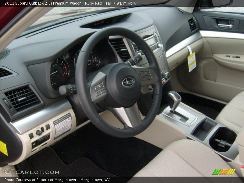Ruby Red Pearl / Warm Ivory 2011 Subaru Outback 2.5i Premium Wagon