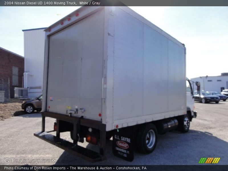 White / Gray 2004 Nissan Diesel UD 1400 Moving Truck