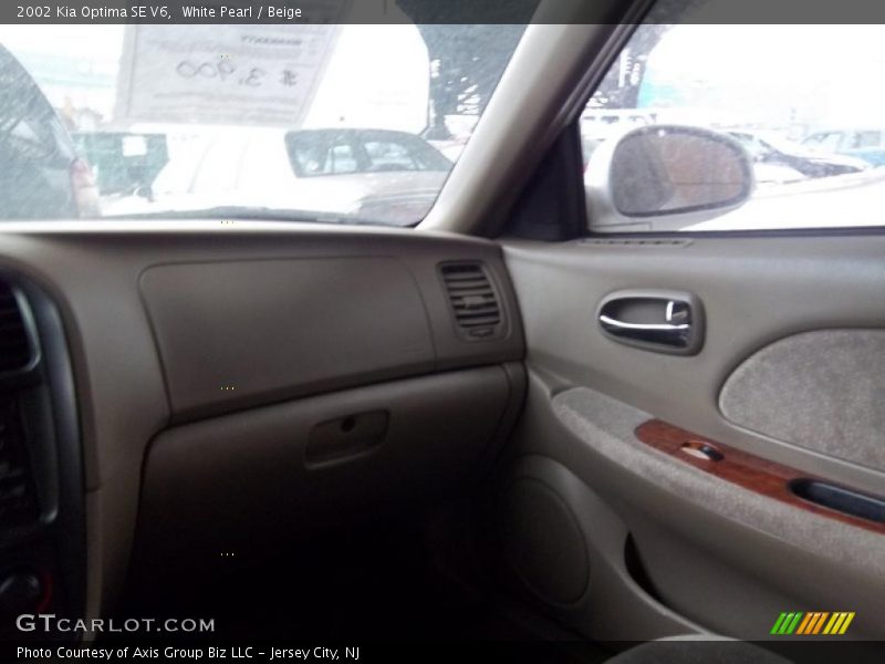 White Pearl / Beige 2002 Kia Optima SE V6