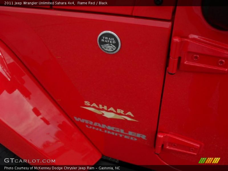 Flame Red / Black 2011 Jeep Wrangler Unlimited Sahara 4x4