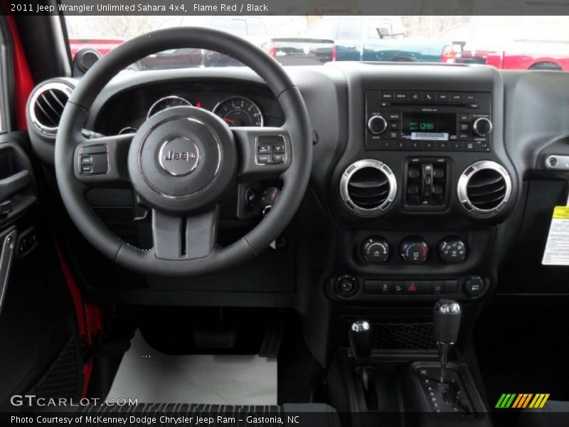 Flame Red / Black 2011 Jeep Wrangler Unlimited Sahara 4x4