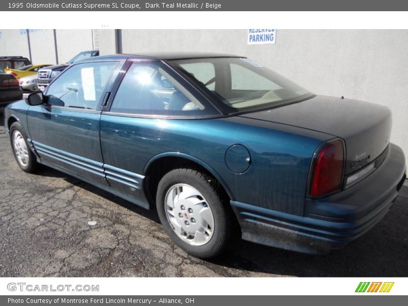 Dark Teal Metallic / Beige 1995 Oldsmobile Cutlass Supreme SL Coupe