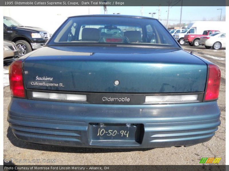 Dark Teal Metallic / Beige 1995 Oldsmobile Cutlass Supreme SL Coupe