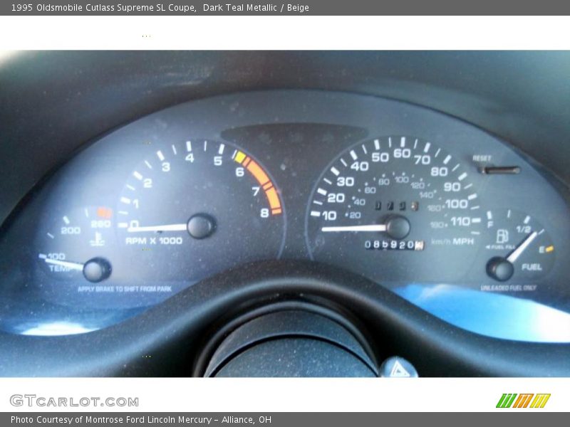 Dark Teal Metallic / Beige 1995 Oldsmobile Cutlass Supreme SL Coupe