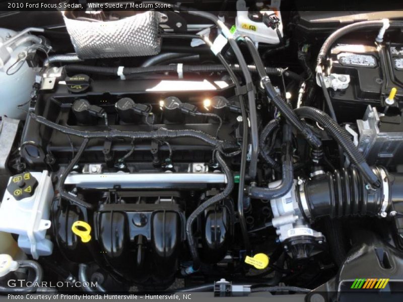 White Suede / Medium Stone 2010 Ford Focus S Sedan