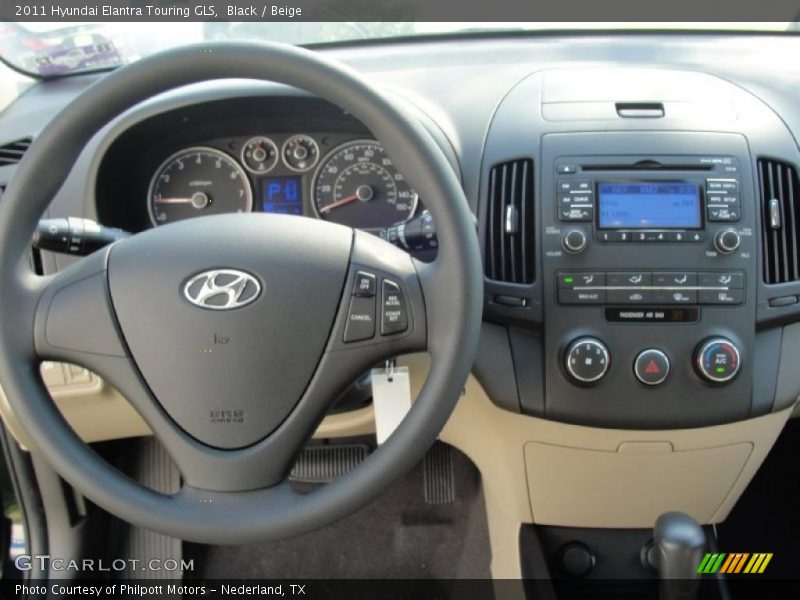 Dashboard of 2011 Elantra Touring GLS
