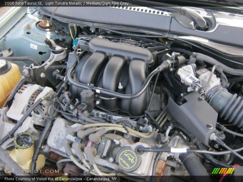 Light Tundra Metallic / Medium/Dark Flint Grey 2006 Ford Taurus SE