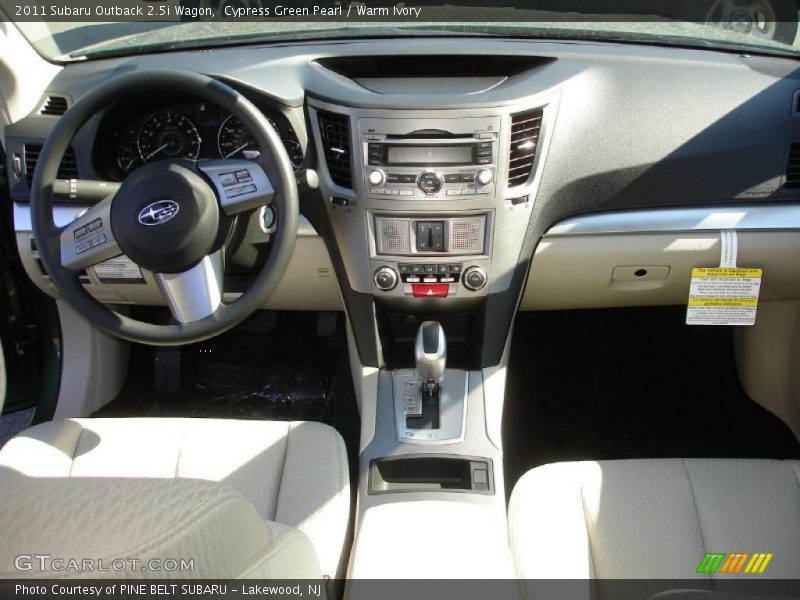 Dashboard of 2011 Outback 2.5i Wagon