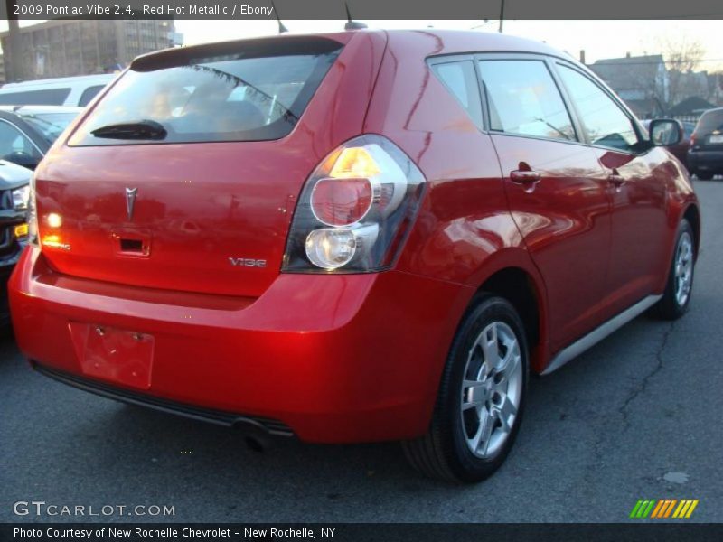 Red Hot Metallic / Ebony 2009 Pontiac Vibe 2.4