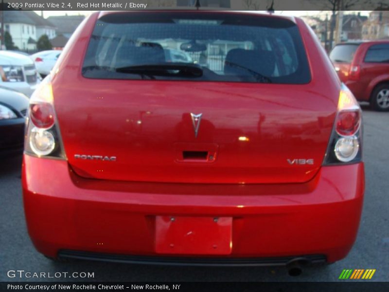 Red Hot Metallic / Ebony 2009 Pontiac Vibe 2.4