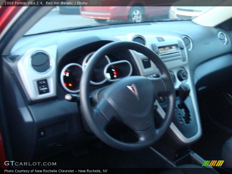Red Hot Metallic / Ebony 2009 Pontiac Vibe 2.4