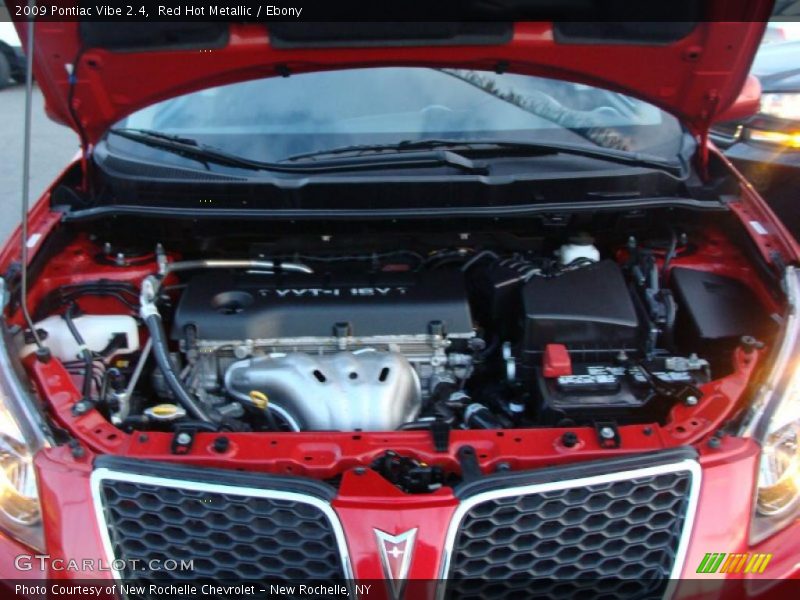 Red Hot Metallic / Ebony 2009 Pontiac Vibe 2.4