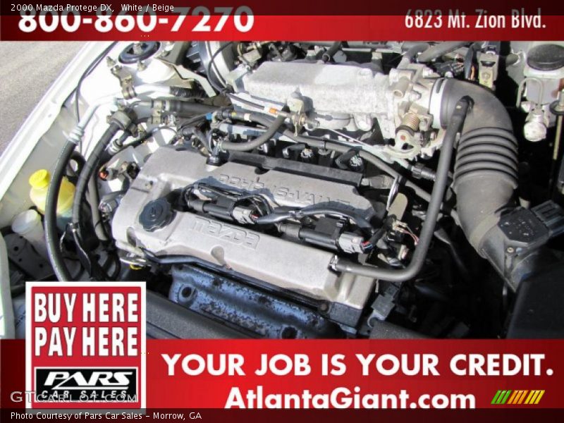 White / Beige 2000 Mazda Protege DX
