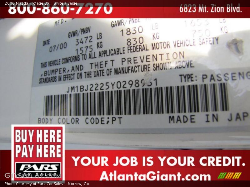 White / Beige 2000 Mazda Protege DX