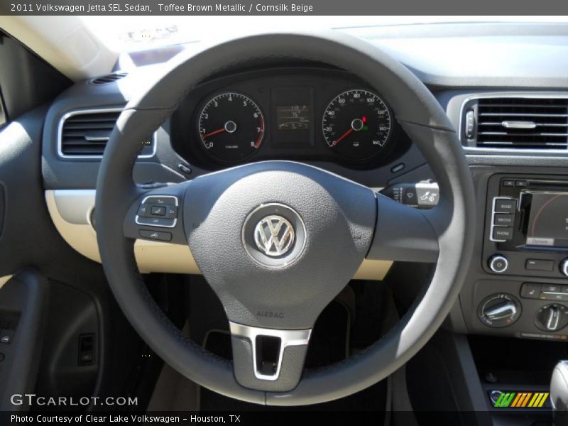 Toffee Brown Metallic / Cornsilk Beige 2011 Volkswagen Jetta SEL Sedan