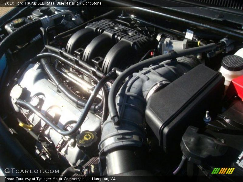 Steel Blue Metallic / Light Stone 2010 Ford Taurus SEL