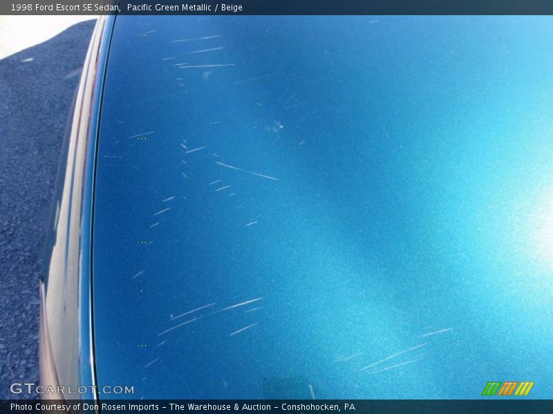 Pacific Green Metallic / Beige 1998 Ford Escort SE Sedan