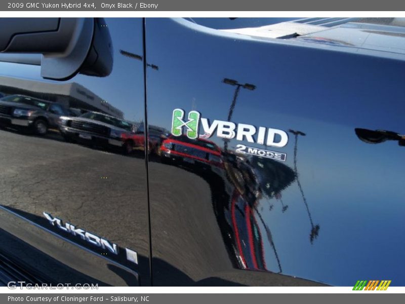  2009 Yukon Hybrid 4x4 Logo