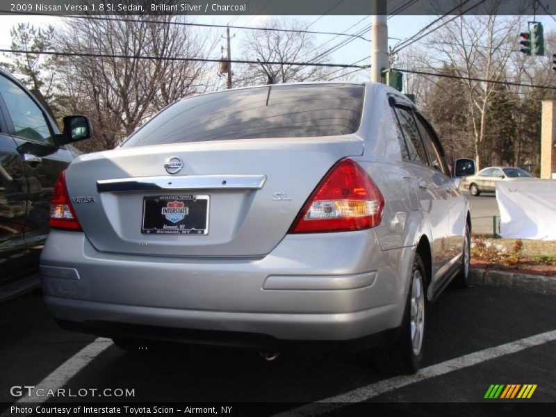 Brillant Silver / Charcoal 2009 Nissan Versa 1.8 SL Sedan