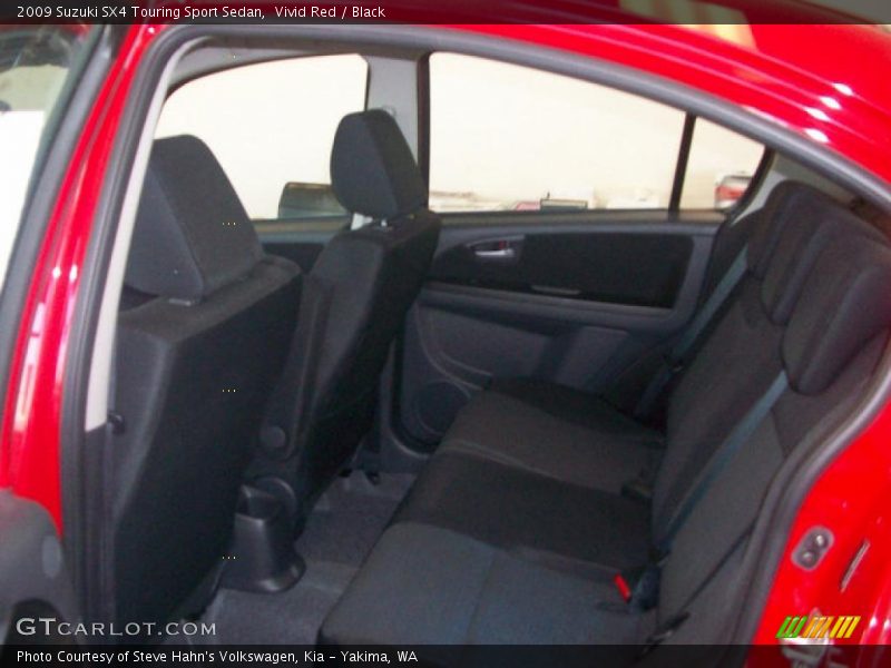 Vivid Red / Black 2009 Suzuki SX4 Touring Sport Sedan